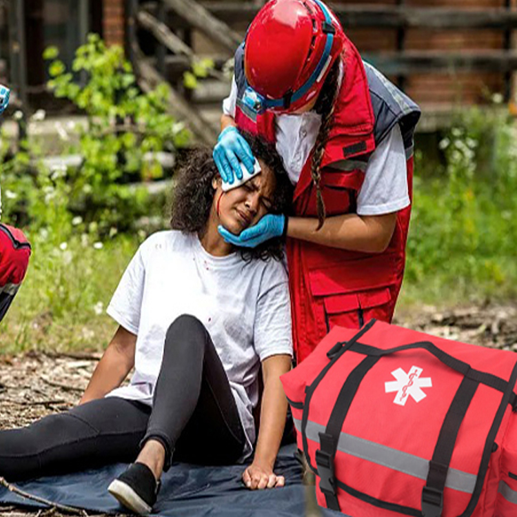 Kit de traumatologie EMT/EMS Professional Essentials entièrement approvisionné pour premiers intervenants | Approuvé HSA/FSA | Sac réfléchissant avec 8 poches et compartiments zippés et plus de 200 fournitures de premiers secours – Orange