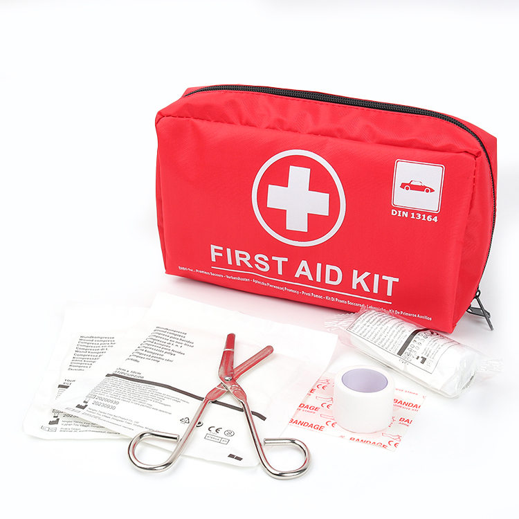 Que devrait contenir une trousse de premiers secours Din13164 pour une utilisation sur route